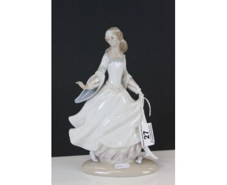 Lladro ceramic model of a Maiden with shoe off her foot