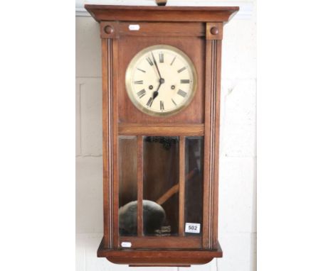 Early 20th century Oak Cased Wall Hanging Clock with Roman  plus a Vintage Saw