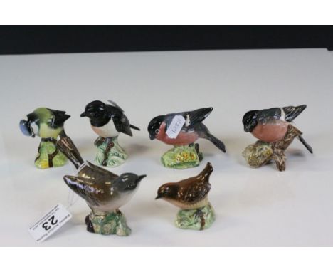 Six Beswick ceramic models of Birds to include 2 x Bullfinches, Whitethroat, Stonechat, Bluetit, Wren