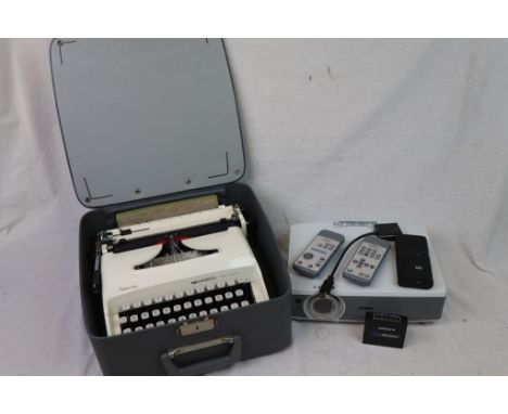 Vintage Typewriter plus Two Digial Projectors and Accessories made by Canon and 3M