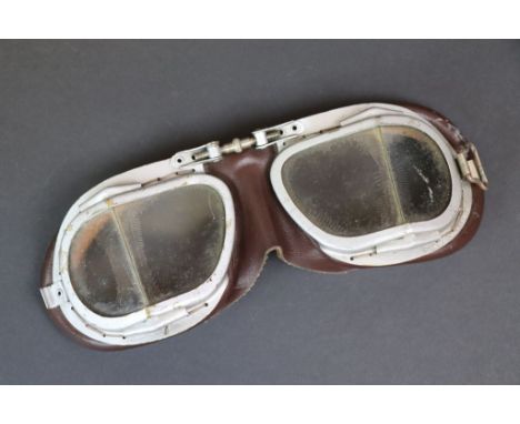 Pair of vintage brown leather cadium goggles 903370, missing strap