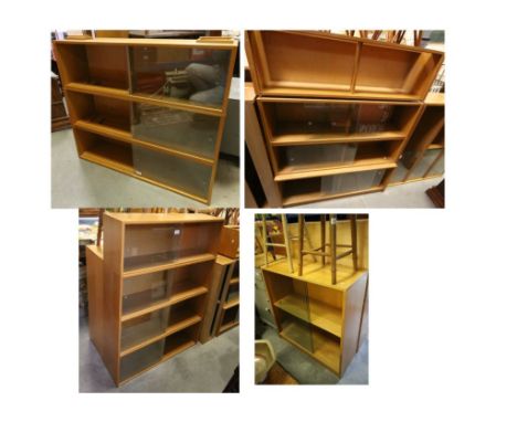 Quantity of Phoenix Light Oak Modular Stacking Bookcases comprising one large base unit with sliding glass doors, one small b