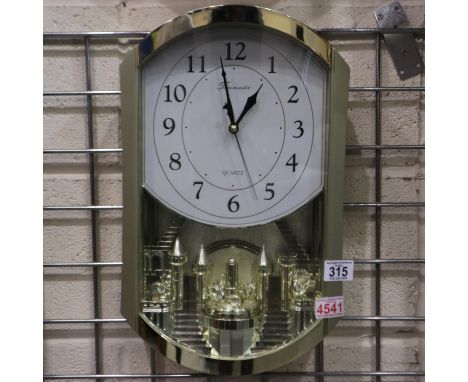Timemaster Quartz rotary pendulum, crystal spinning swans musical wall clock, with 15 different melodies. Working at lotting 