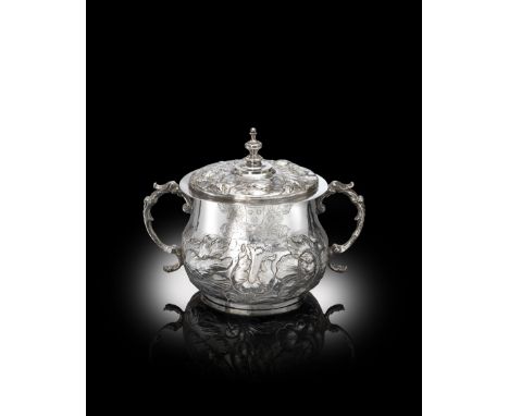 A Charles II silver two-handled porringer and cover, maker's mark WC, London 1662, the body and cover embossed and chased wit