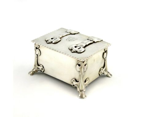An Edwardian silver Art Nouveau box, by William Hutton & Sons Ltd, London 1902, in the form of a rectangular casket, spot-ham