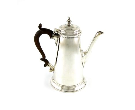A George II silver coffee pot, by John Swift, London 1734, tapering circular form, scroll handle, domed cover with a knop fin