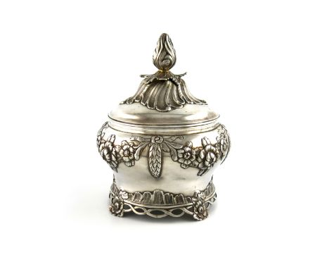 An 18th century Dutch silver tobacco jar and cover, by Wijnand Warneke, Amsterdam 1775, baluster form, embossed foliate decor