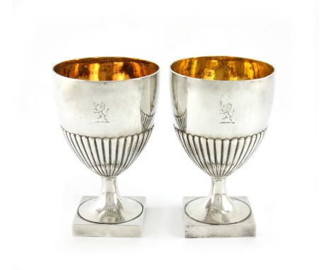 A pair of George III silver goblets, by John Wakelin and Robert Garrard, London 1796, urn shaped bowls, part-fluted decoratio