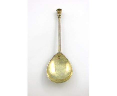 A seventeenth century silver-gilt Seal-top spoon, marked once in the bowl and three times on the stem with a petal mark, unsc