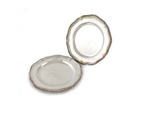 A pair of Victorian silver plates, by Robert Garrard, London 1857, circular form, gadroon border, engraved with an armorial, 