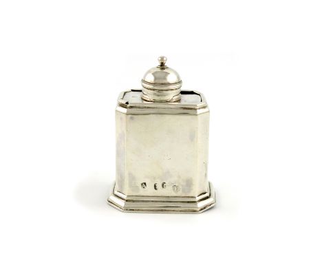 A George I silver tea caddy, by John Farnell, London 1716, rectangular form, canted corners, slide-off top with a domed pull-