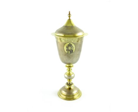 A presentation silver-gilt cup and cover, by Carrington and Co, London 1911, tapering circular bowl with matted decoration, o