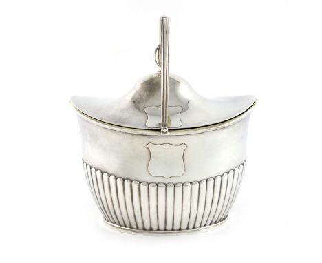 A George III silver swing-handled sugar basket and cover, by Richard Cooke, London 1799, oval form, fluted decoration, reeded