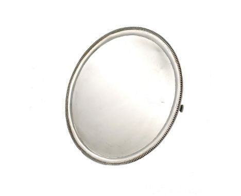 A George III Scottish silver salver, by James Hewitt, Edinburgh 1784, circular form, beaded border, on three bracket feet, di