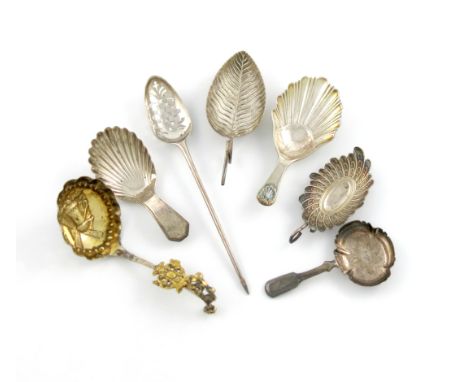 A mixed lot of silver flatware, comprising: a mid 18th century mote spoon, the bowl pierced with mullets and scroll decoratio