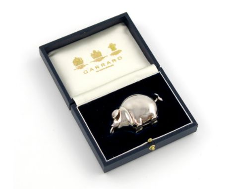 A modern novelty silver pig tape measure, by Garrard, London 1995, the standing pig with a ring through its nose, with a spru