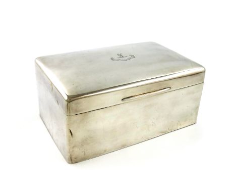 An Edwardian silver cigar box, possibly by Frederic Hewson, London 1906, rectangular form, solid hinged cover engraved with a