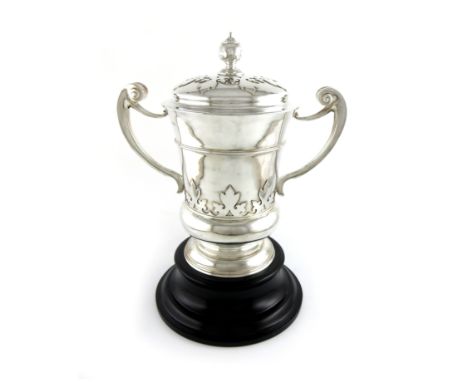 An Edwardian silver two-handled cup and cover, by J.B Carrington, London 1904, tapering circular bellied form, scroll handle,