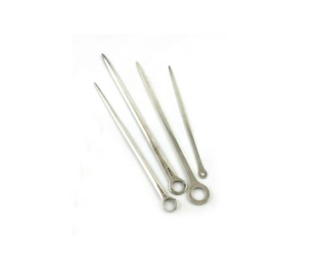 A small collection of four antique silver meat skewers, comprising: one by John Robinson II, London circa 1740, plain ring te