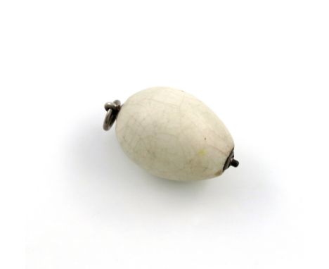 A Victorian novelty silver-mounted pencil, by S. Mordan and Co, the ceramic body modelled as a bird's egg, with a ring attach