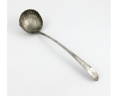 A George III Irish silver Bright-cut Star pattern soup ladle, maker's mark twice ?M, over-struck with maker's mark of Samuel 