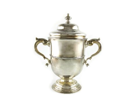 A George II silver two-handled cup and cover, by Richard Guerney and Co, London 1746, circular form, leaf capped scroll handl