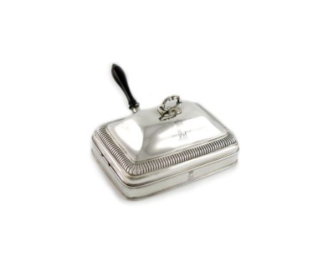 A George III silver cheese warming dish, by Paul Storr, London 1804, rounded rectangular form, domed hinged cover with a flut
