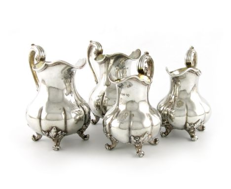 A graduated set of four early-Victorian silver cream jugs, by Paul Storr, London 1837, two sizes, lobed baluster form, leaf c