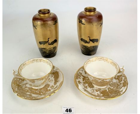 2 Royal Crown Derby 'Gold Aves' cups and saucers and pair of gold coloured stork design lustre vases 7" high