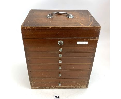 Vintage dental tool cabinet with 6 drawers and lift up top, with key and assorted dental tools. 13" long x 9" wide x 16" high