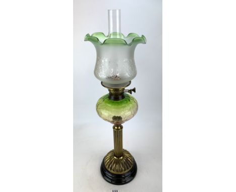 Oil lamp with green and white glass shade and glass chimney, 27.5" high