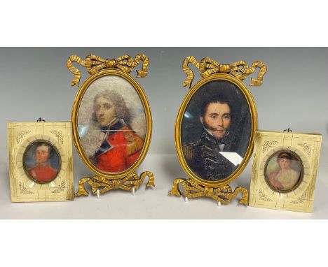 A pair of contemporary neoclassical style giltwood oval portrait miniature frames, moulded and carved, each with ribbon tied 