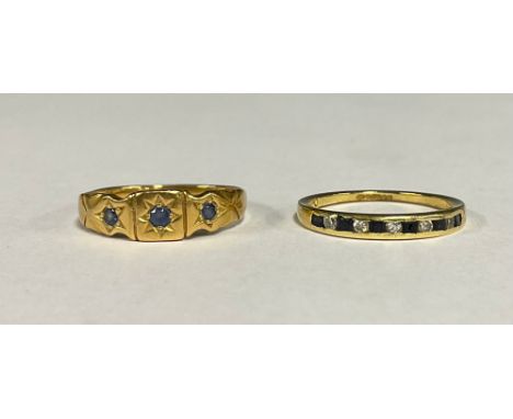 A sapphire and diamond half eternity ring, alternate chanel set with six deep blue square sapphires and five round brilliant 