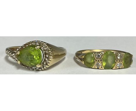 A 9ct gold and peridot ring; another (2) 