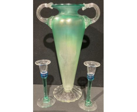 A Loetz type two-handled amphora glass vase, in iridescent green, 37cm high, indistinctly signed; a pair of Art Glass candles