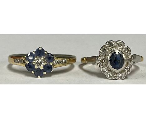 An 18ct gold and platinum blue and white stone ring; another similar (2) 