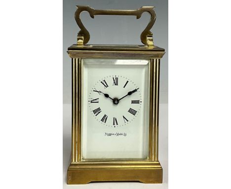 A Mappin &amp; Webb Ltd brass and lacquer carriage clock, fluted columns, bevelled glass, shaped carrying handle, 15cm high o