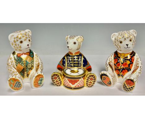A Royal Crown Derby paperweights, Regal Goldie Teddy Bear, limited edition of 1000, signed, gold stopper; others, Debonair Be