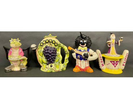 A Totally Teapots novelty teapot, Pinball Wizard, limited edition 27/99, 31cm high; others, Crocodile Rock, limited edition 4