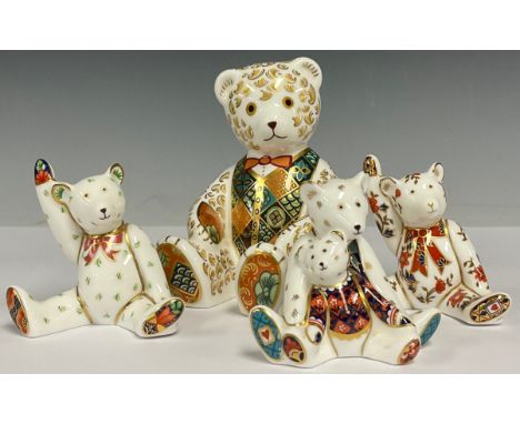 A Royal Crown Derby paperweight, Goldie Teddy Bear, indistinctly signed, gold stopper, others Mini Bears waving, and mother a