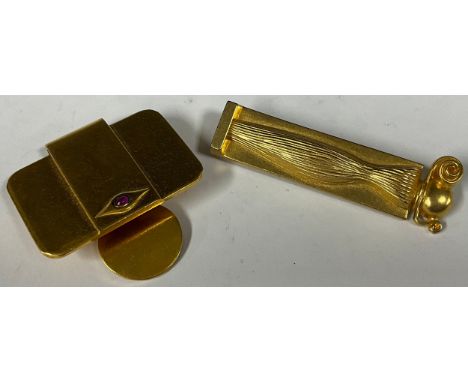 An Yves Saint Laurent gold plated money clip, impressed marks, no 02170 initialed verso;  a Givenchy Paris Organza brooch (2)