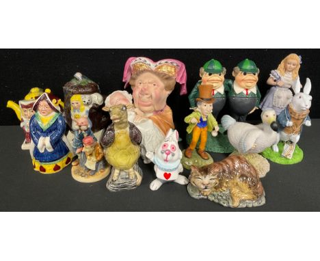 A set of three Beswick Alice Series models, Queen of Hearts, Mock Turtle and Cheshire Cat; a Goebel Alice In Wonderland model