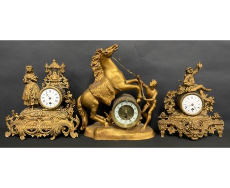 A 19th century French gilt metal mantel clock, c.1890; others (3)