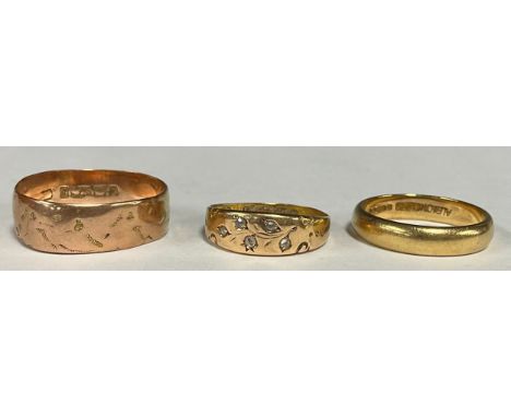 A 15ct gold and diamond ring; a 9ct gold wedding band; another (3) 