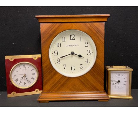 A London clock company mantel clock; a seiko bedside clock, quartz movement, Roman numerals dial; a timecal carriage clock, R