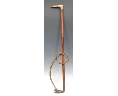 An early 20th century leather coaching whip, L-shaped antler handle, the baton 75cm long, c. 1920