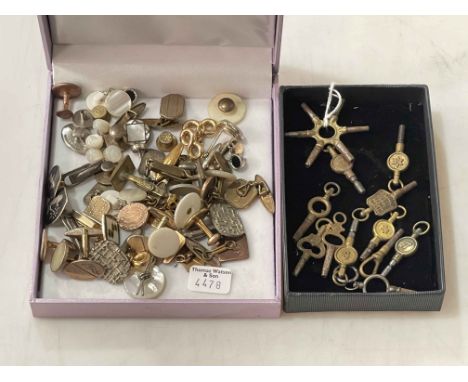 Collection of watch keys, cufflinks and studs.