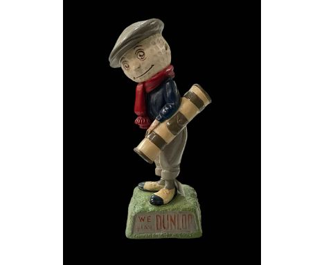 Resin Dunlop golf figure, 39cm.