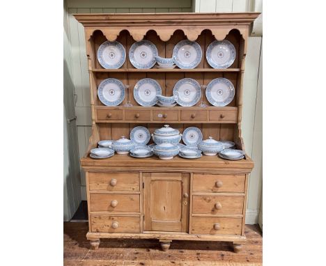 Victorian pine dresser, the two tier shelf back with five spice drawers above a base of six drawers with central cupboard doo