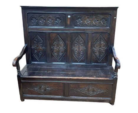 Antique oak high carved panel back box hall bench, 137cm by 144cm by 59cm.